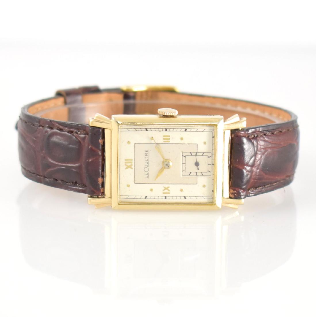 LeCoultre rectangular gents wristwatch: LeCoultre rectangular gents wristwatch, Switzerland/USA around 1945, gold plated 2 piece construction case, snap on case back, silvered duotone-dial restored, gilded indices & hands, constant second a