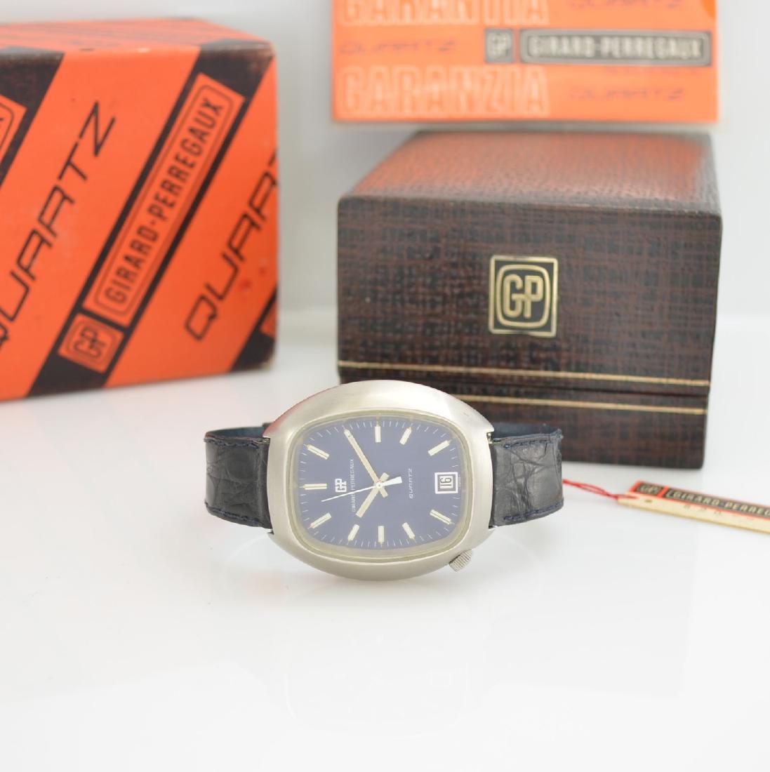 GIRARD-PERREGAUX early quartz watch calibre 353 with: GIRARD-PERREGAUX early quartz watch calibre 353 with box & papers, Switzerland around 1972, screwed down steel case, seal has to be replaced, winding crown at 7, blue dial with raised silvered indexes