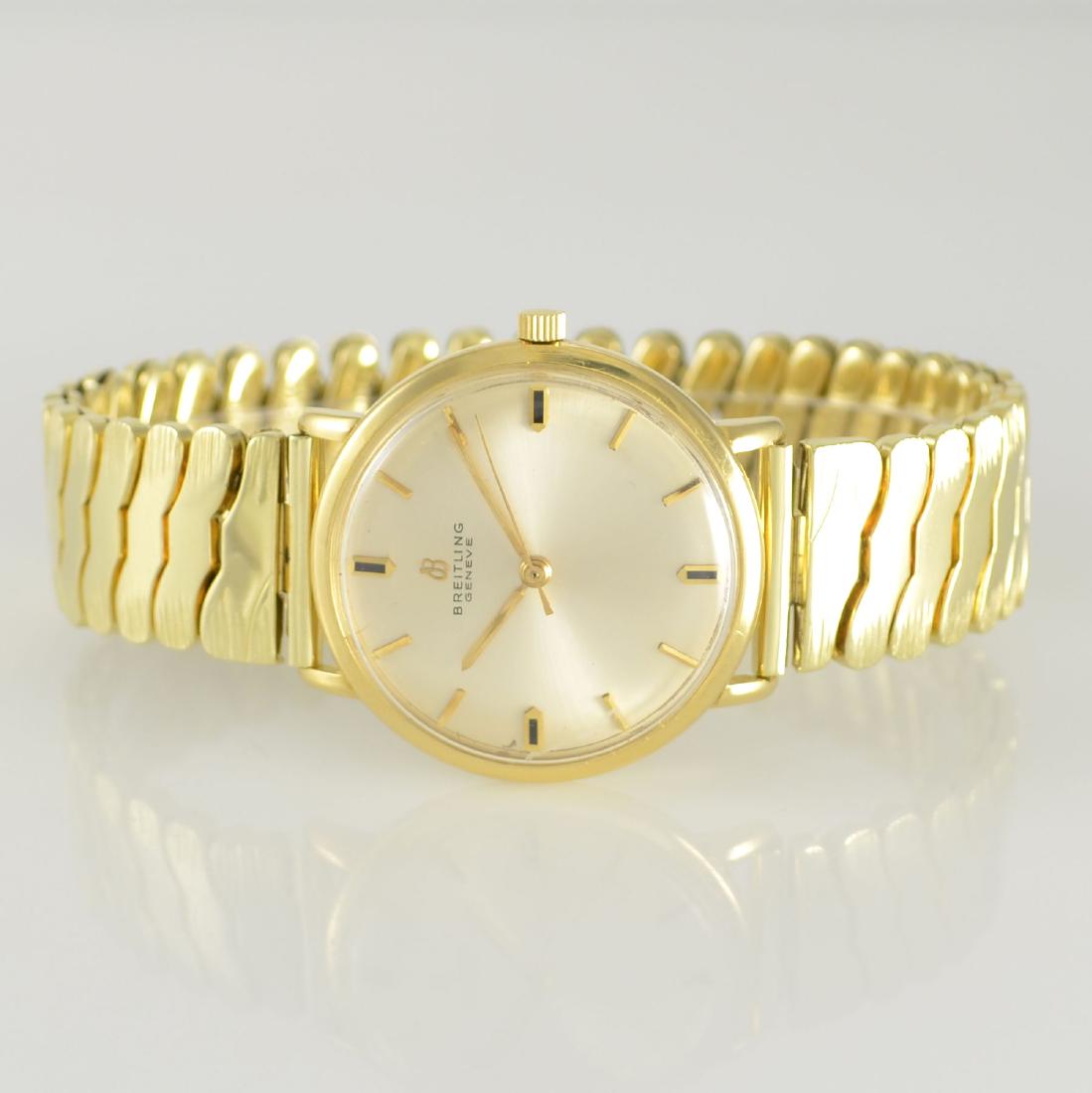 BREITLING Geneve 18k yellow gold gents wristwatch: BREITLING Geneve 18k yellow gold gents wristwatch reference 2520 & 14k yellow gold cover Elasto-Fixo bracelet, Switzerland around 1961, self winding, monocoque-case, silvered dial with raised hour-ind