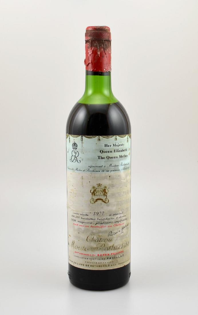 1 bottle 1977 Chateau Mouton Rothschild, Pauillac: 1 bottle 1977 Chateau Mouton Rothschild, Pauillac, Premier Grand Cru Classe, approx 75 cl, , filling level: approx upper mid shoulder, label and capsule soiled and damaged, not tasted , Dedication lab