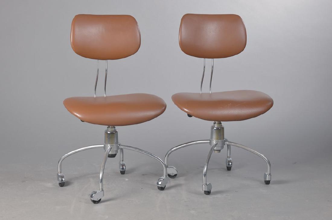 Six office chairs, designed by Egon Eiermann, Wilde &: Six office chairs, designed by Egon Eiermann, Wilde & Spith, Esslingen, metall bar and iron sheet chromed, partly with label, adjustable backrest with marked synthetic pommel, leatherette covers, H. a