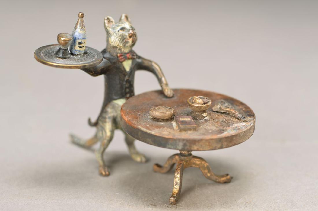 Vienna Bronze, 2.H.20.th. century, cat at table, sign: Vienna Bronze, 2.H.20.th. century, cat at table, sign. Franz Bergmann, approx. H. 6 cm