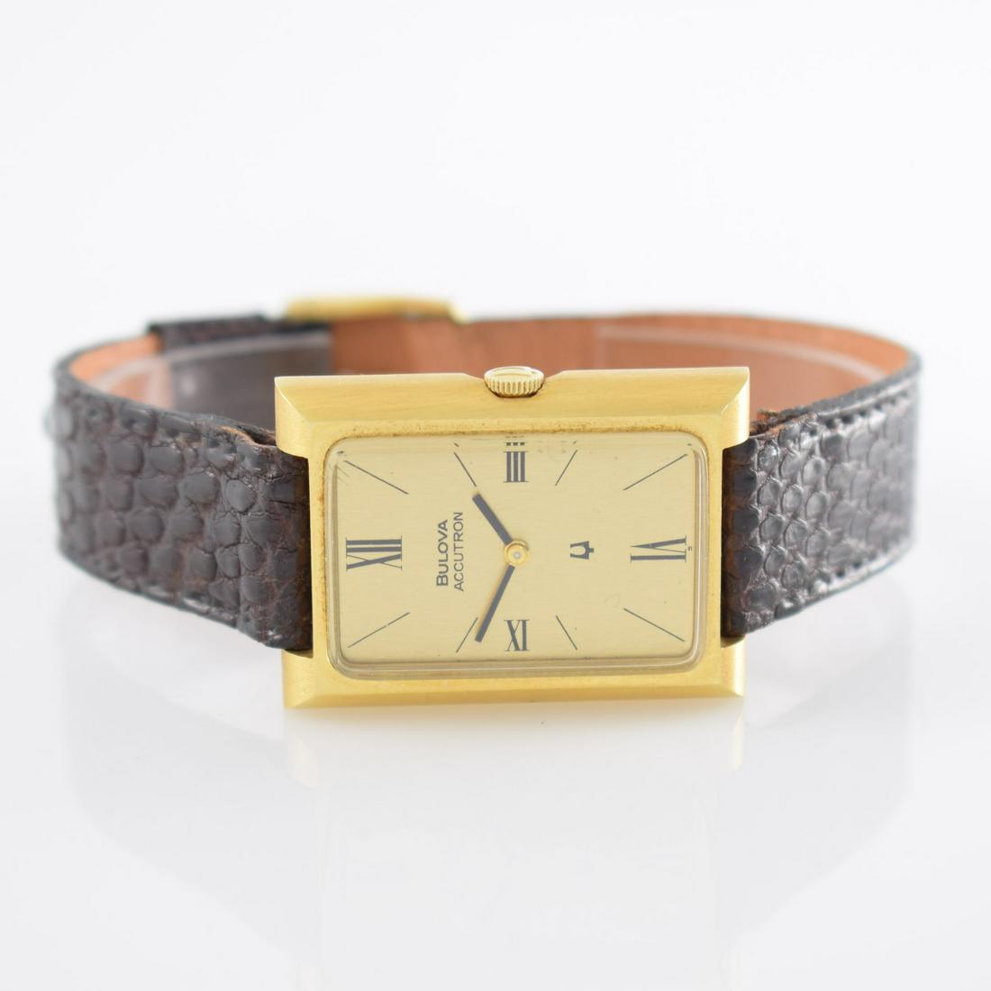 BULOVA Accutron rare 18k gold tuning fork wristwatch: BULOVA Accutron rare 18k yellow gold tuning fork ladies wristwatch, Switzerland around 1970, heavy rectangular case, snap on case back, original winding crown, gilded dial, Roman numerals, black hands