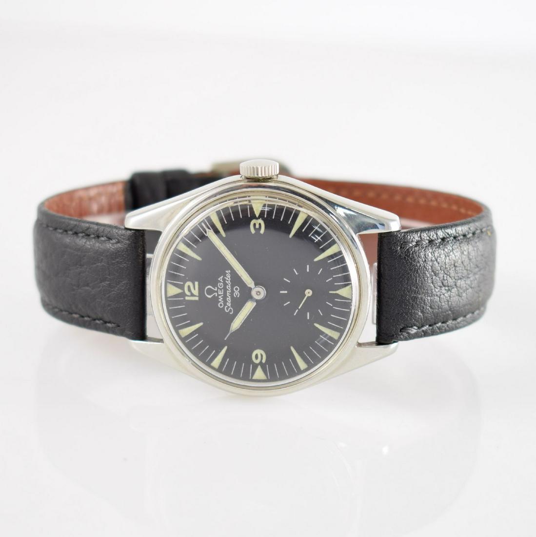 OMEGA Seamaster reference 2990-1 gents wristwatch: OMEGA Seamaster reference 2990-1 gents wristwatch in steel, Switzerland around 1957, manual winding, two piece construction case, snap on case back, black dial restored, luminous indexes, constant sec