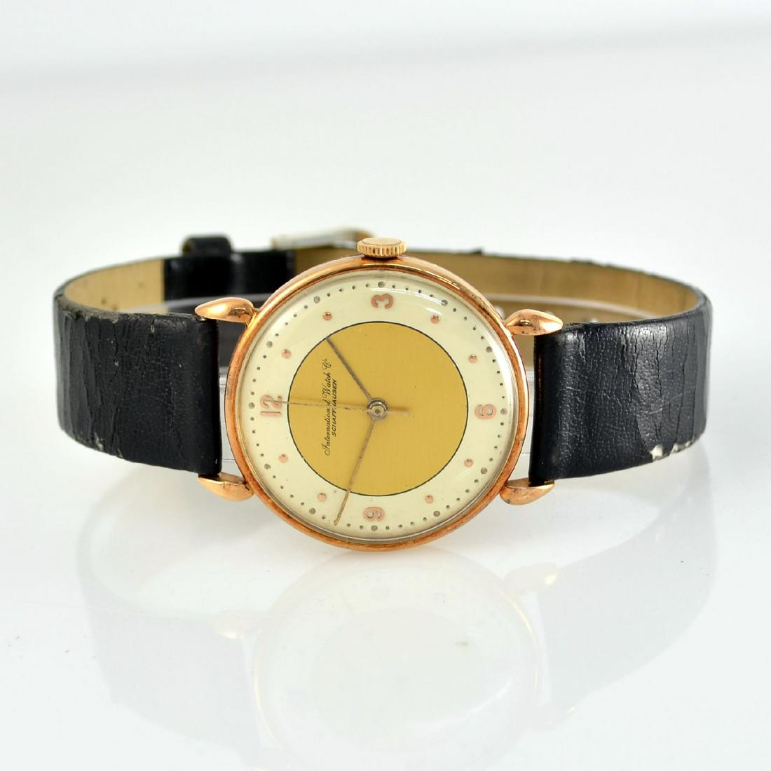 IWC calibre 61 18k pink gold wristwatch: IWC calibre 61 18k pink gold wristwatch, manual winding, Switzerland around 1942, snap on case back, fancy lugs, duoton-dial restored, display of hours, minutes & sweep seconds, nickel plated movement
