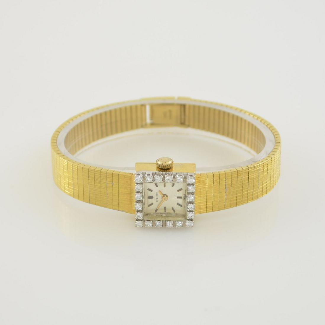 ETERNA 18k gold diamond set ladies wristwatch: ETERNA 18k yellow gold ladies wristwatch with diamond set bezel, manual winding, Switzerland around 1960, snap on case back, silvered dial with raised indexes due to age spotty/patinated, display of h