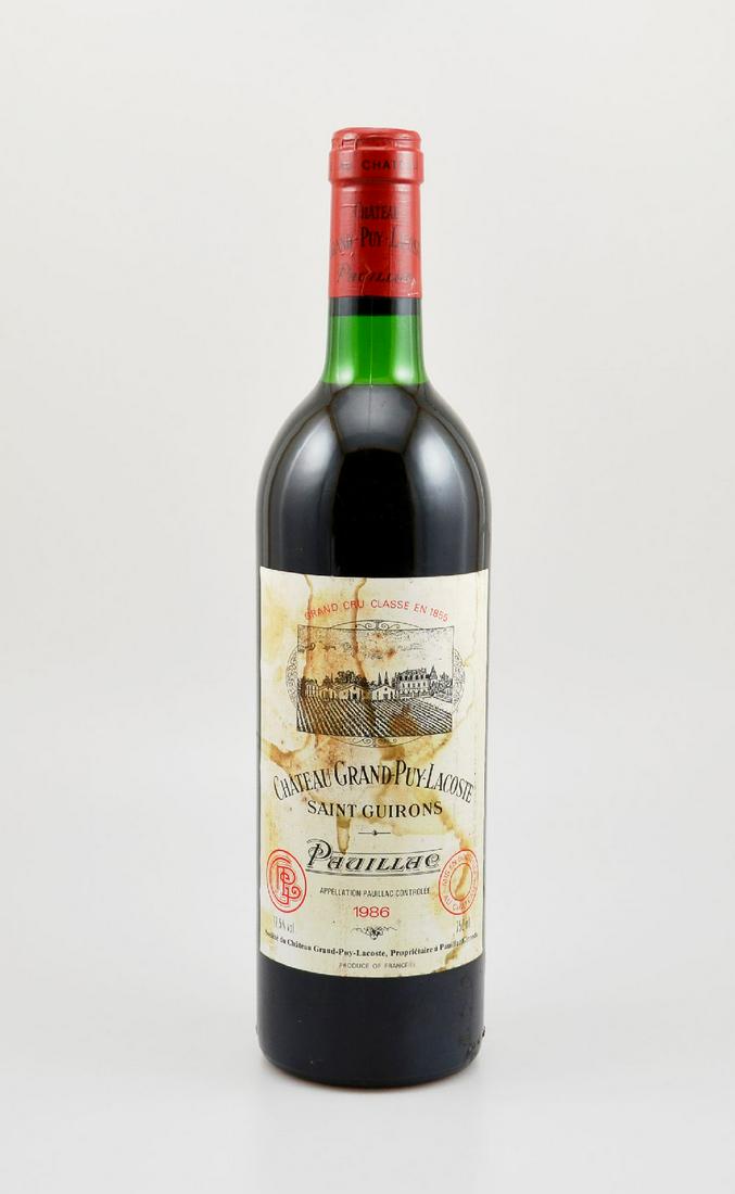 1 bottle 1986 Chateau Grand-Puy-Lacoste,: 1 bottle 1986 Chateau Grand-Puy-Lacoste, Saint Guirons, Pauillac, Grand Cru Classe, approx 75 cl, 12.5 % Vol., filling level: approx top shoulder, label soiled, not tasted, Provenance: From a private