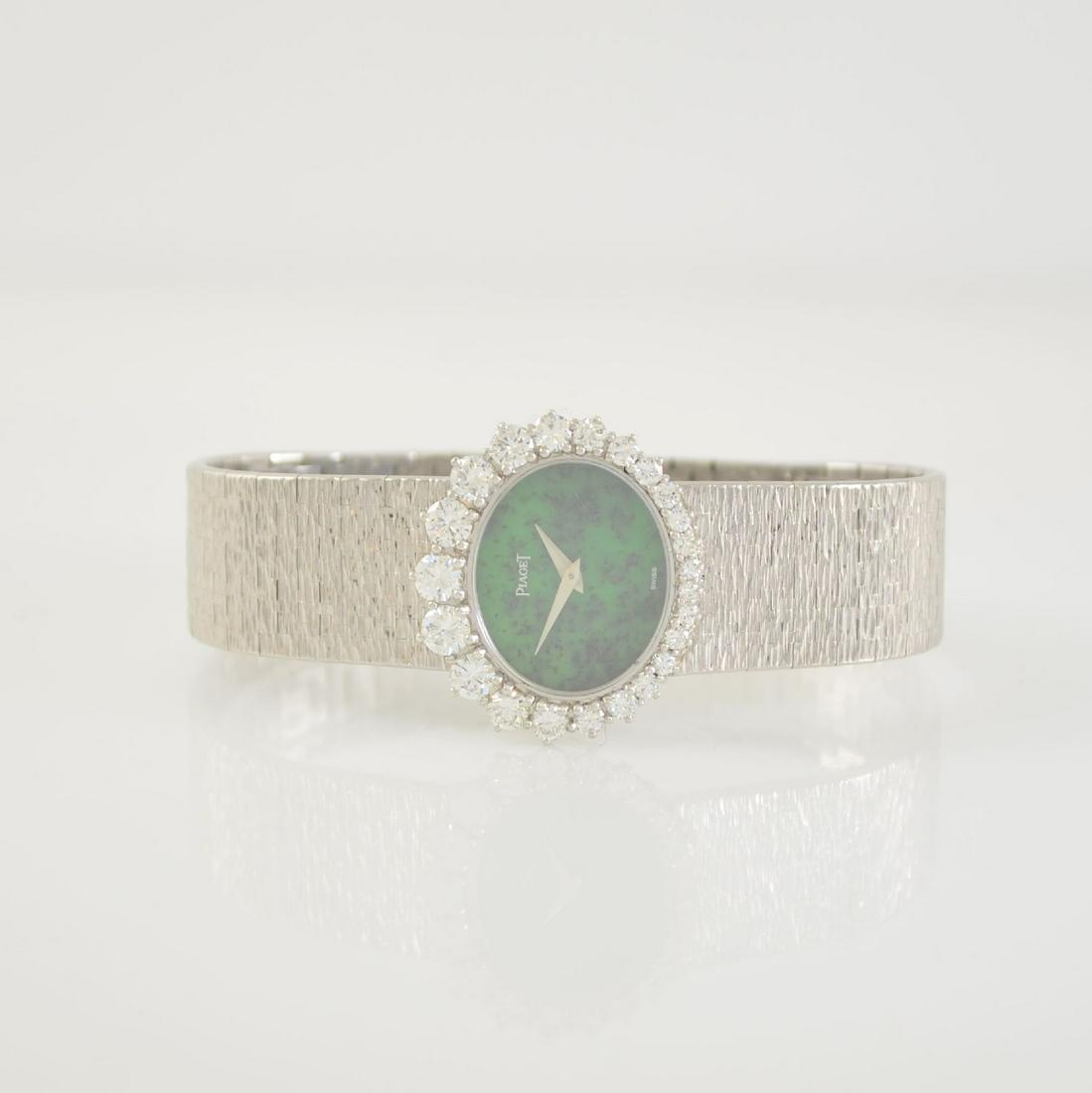 PIAGET rare 18k white gold diamond set ladies: PIAGET rare 18k white gold diamond set ladies wristwatch, Switzerland around 1975, manual winding, two piece construction case reference 9388 A 6 with integrated milanaise bracelet, case back 2-times 