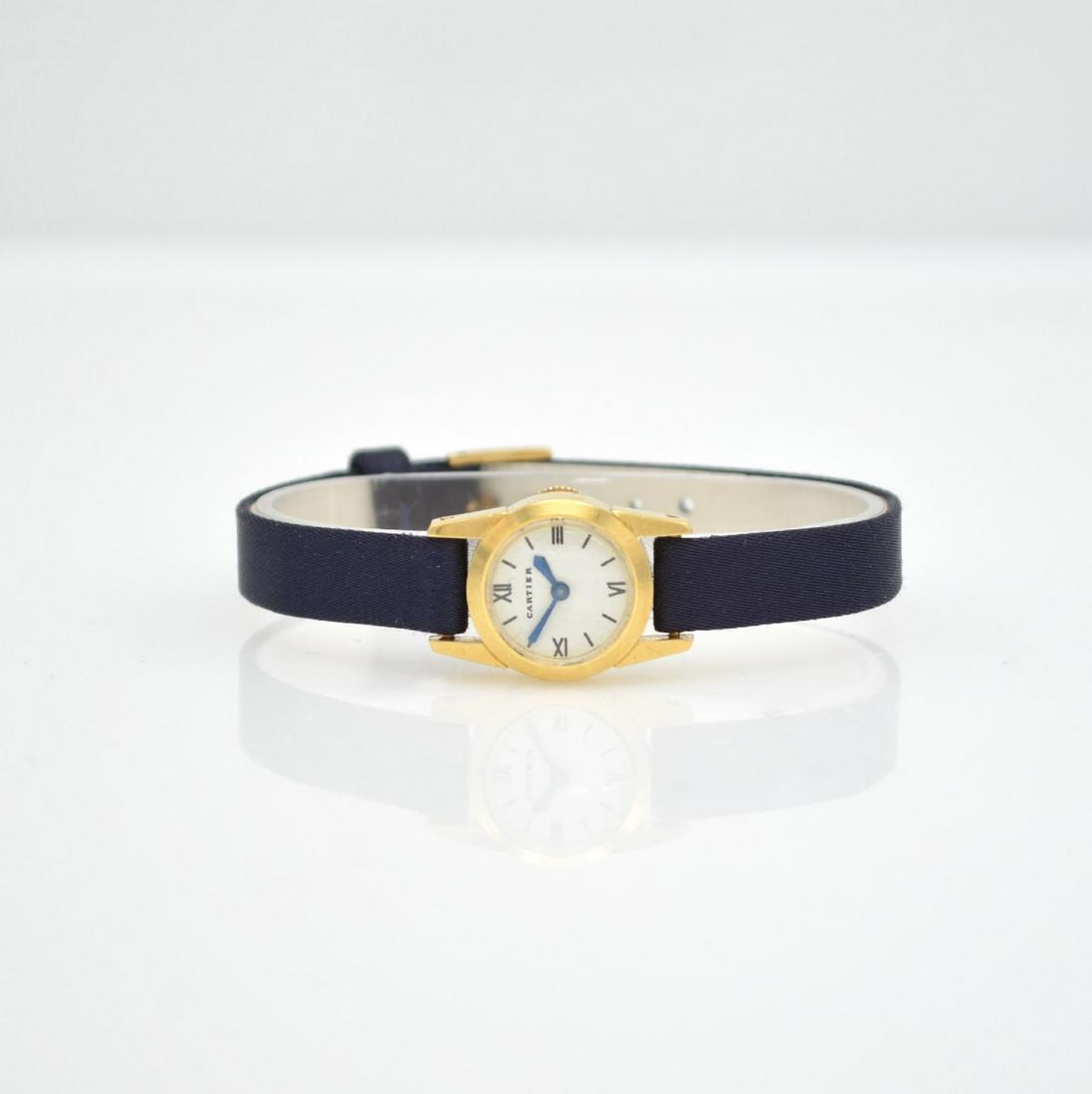 CARTIER 18k yellow gold so called Backwinder wristwatch: CARTIER 18k yellow gold so called Backwinder rare ladies wristwatch, Switzerland around 1950, two-piece construction case, case back 2-times screwed down, neutral leather strap with time identical, fi