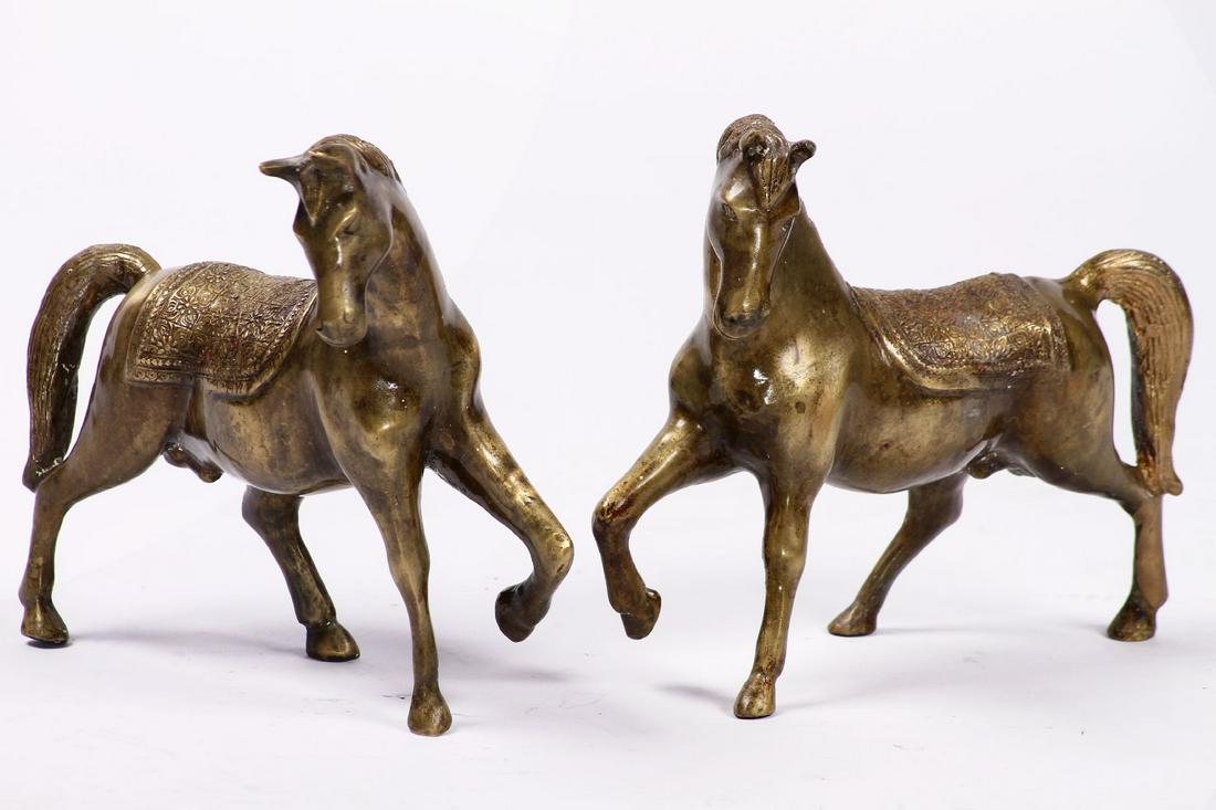 Pair of horses: Pair of horses, solid bronze or full cast, patinated golden brown, successful design, idealistic representation, conceived in opposite directions, nice heavy quality, traces of use, approx. 24x29x9 cm