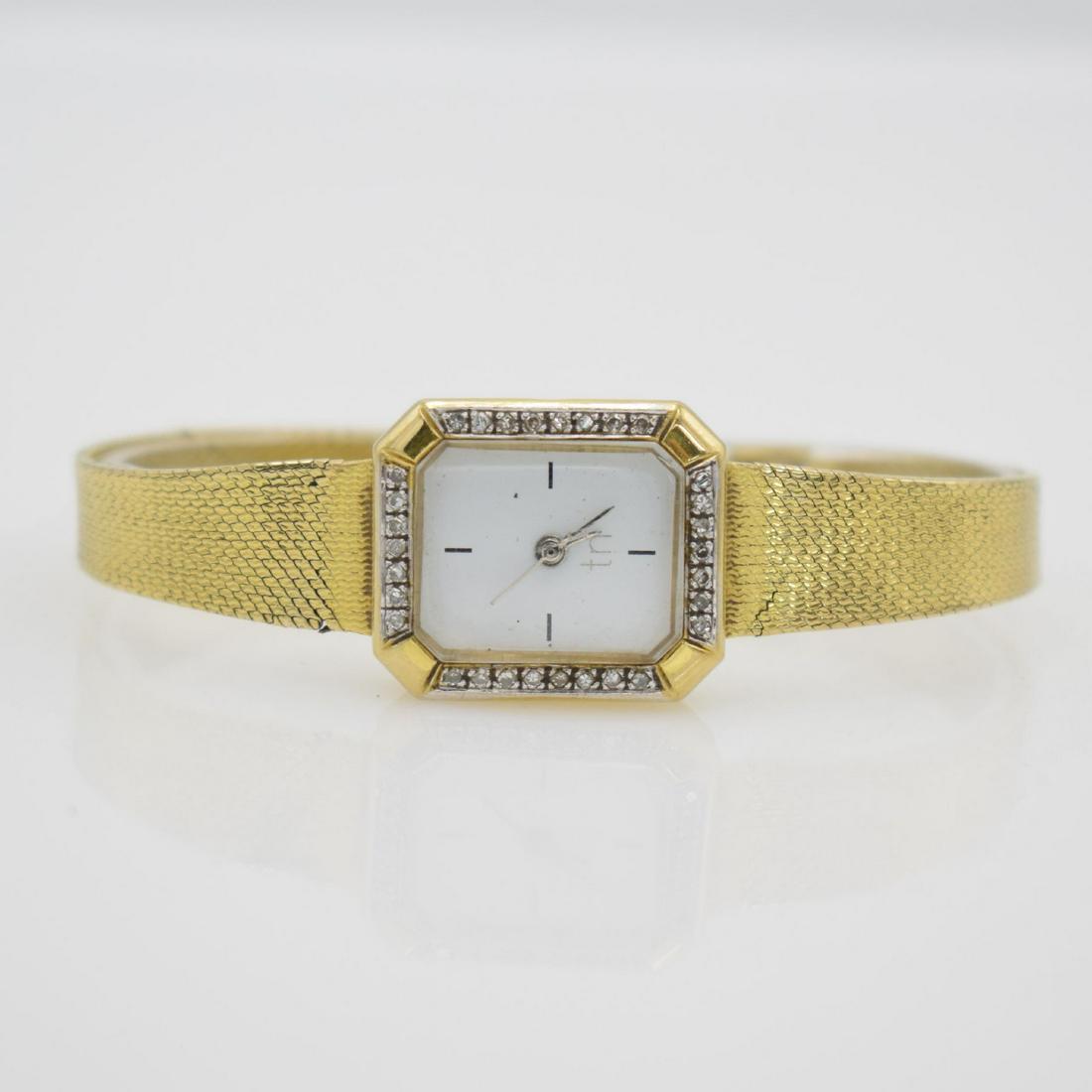 TN 8k yellow gold ladies wristwatch: TN 8k yellow gold ladies wristwatch, Switzerland around 1990, two-piece construction case, snap on case back, bezel lavish diamonds set, 8k yellow gold milanese bracelet, quartz movement fault/has to 