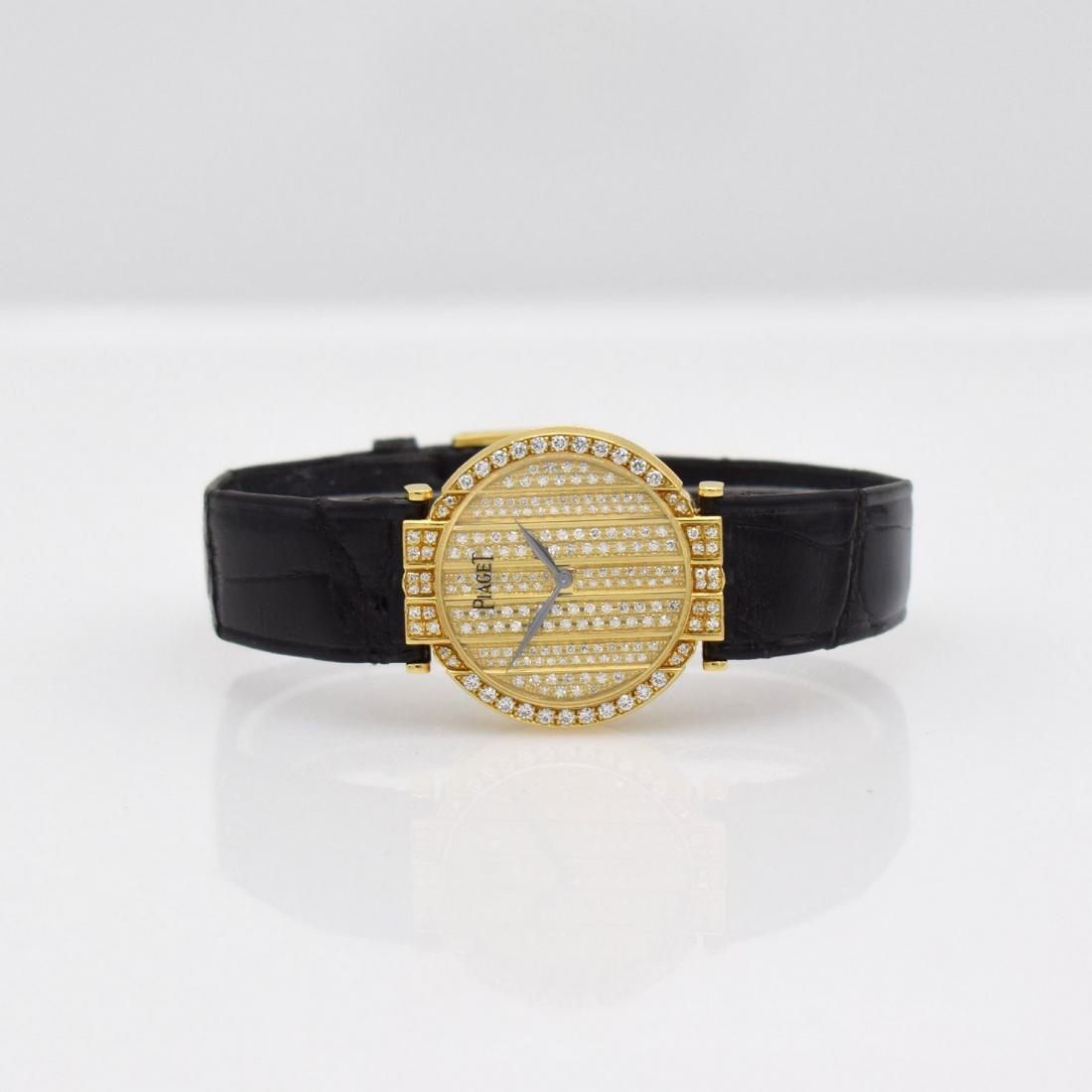 PIAGET fine 18k yellow gold ladies wristwatch series: PIAGET fine 18k yellow gold ladies wristwatch series Polo, Switzerland around 1984, reference 72735, lavish diamonds set case including original leather strap with original 18k yellow gold buckle, cas