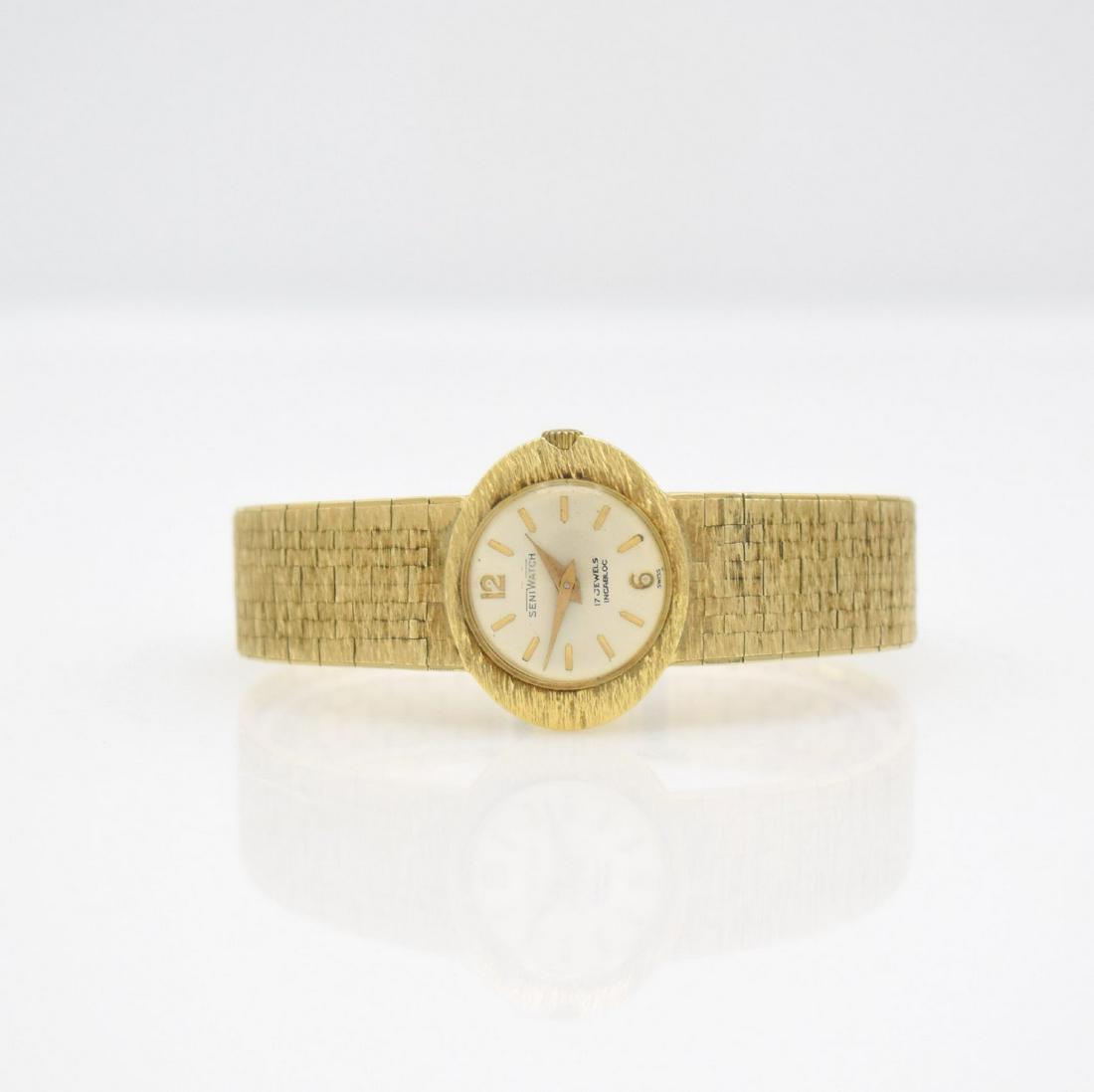 SENIWATCH 14k yellow gold ladies wristwatch: SENIWATCH 14k yellow gold ladies wristwatch, manual winding, Switzerland around 1975, snap on case back, silvered dial with raised indices, display of hours & minutes, calibre Felsa 4130, 17 jewels, i