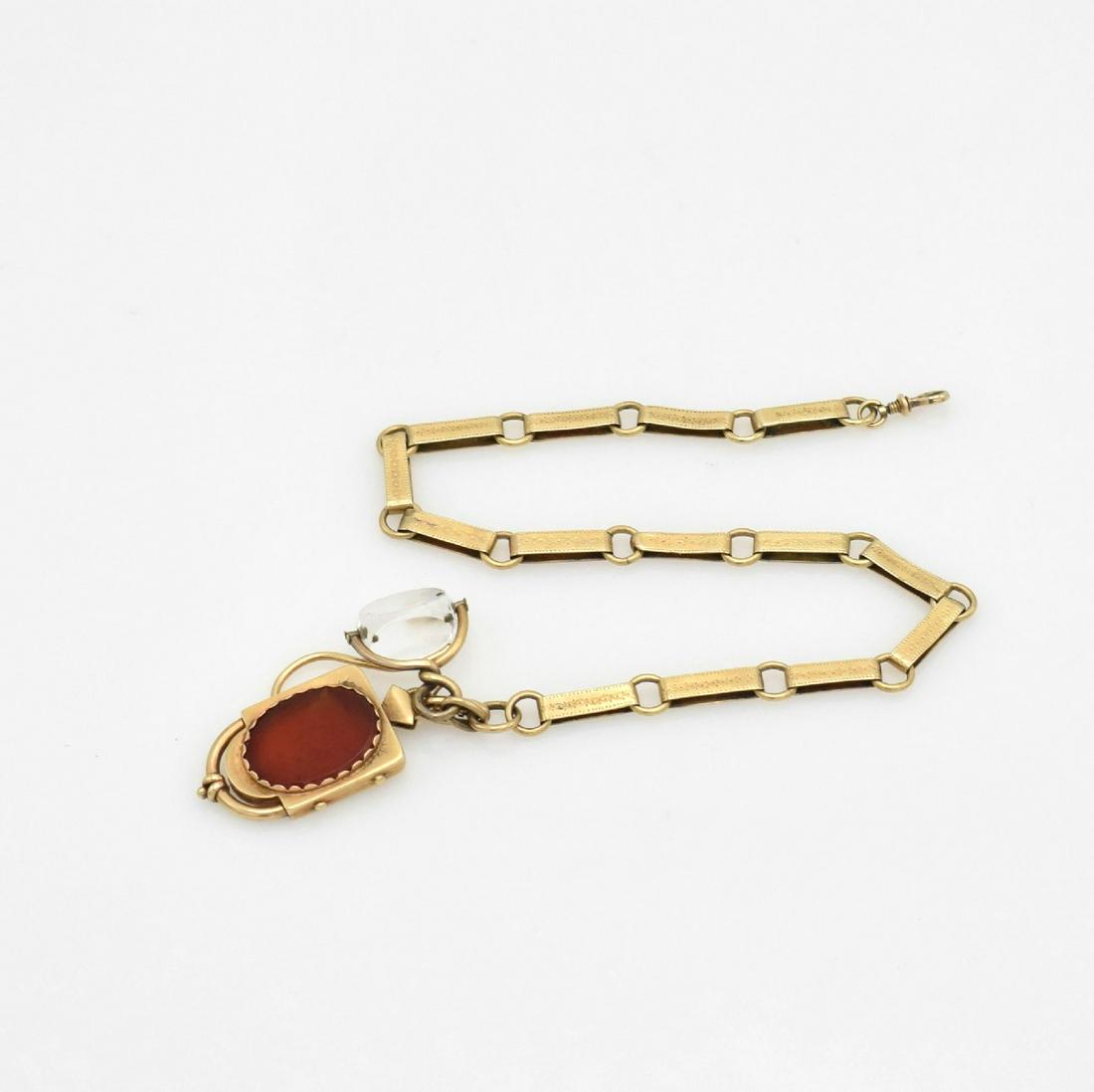 Unusual 14k yellow gold pocket watch chain: Unusual 14k yellow gold pocket watch chain with medallion & letter seal, around 1860, engraved bracelet-links by loops linked, original snap link, medallion with red carnelian, blank letter seal, leng