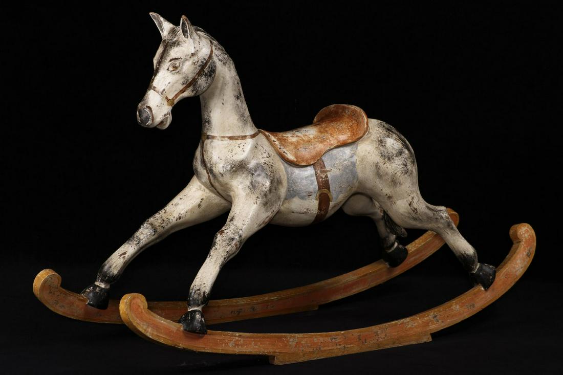 Rocking horse: Rocking horse, solid wood, on runners, these fastened by a base, coloured in various colours and patinated, good tension, ideal as a decorative object, slight traces of use, approx. 84x137x48 cm