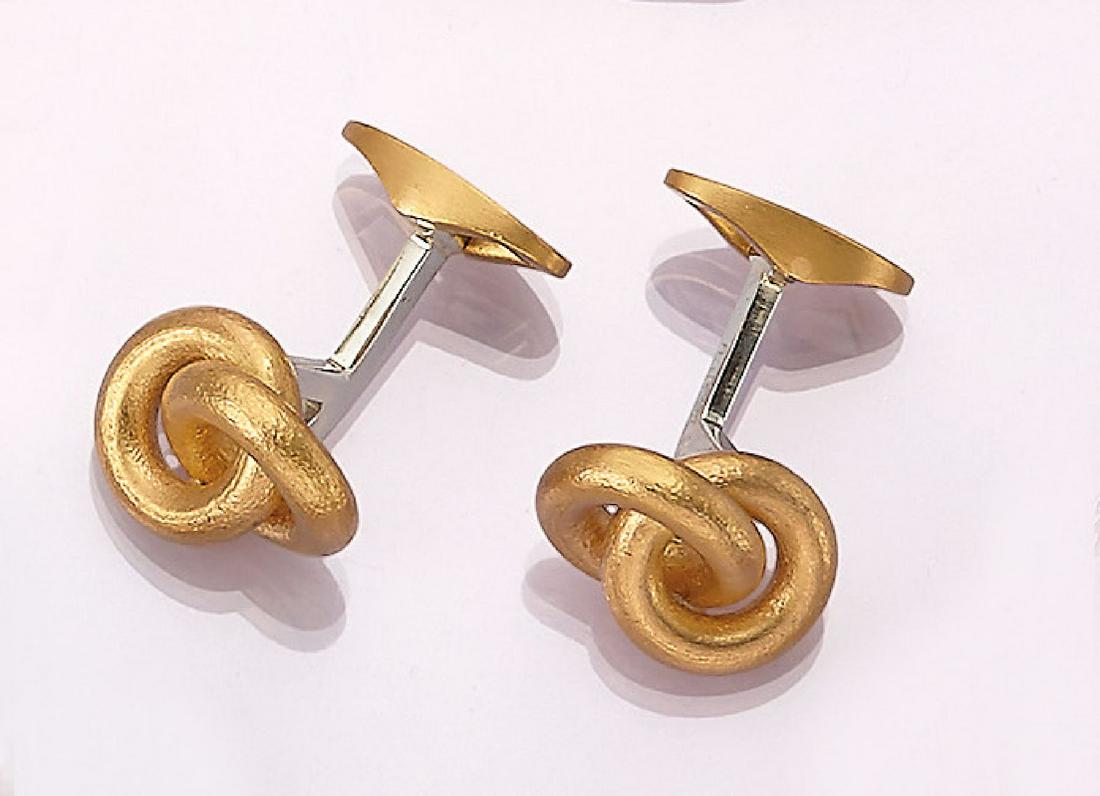 Pair of 23 kt gold EMIL KRAUS/Kahn cufflinks: Pair of 23 kt gold EMIL KRAUS/Kahn cufflinks , YG 990/000, class. node shape, fine mattfinished, wire platinum 950/000, fine workof the goldsmith, total approx. 33.1 g