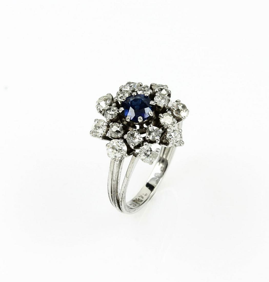 Platinring with sapphire and diamonds: Platinring with sapphire and diamonds , centered round bevelled sapphire approx. 0.75 ct, 16 old cut diamonds total approx. 1.65 ct Wesselton-Crystal/p, ringsize 51, approx. 5.6 g
