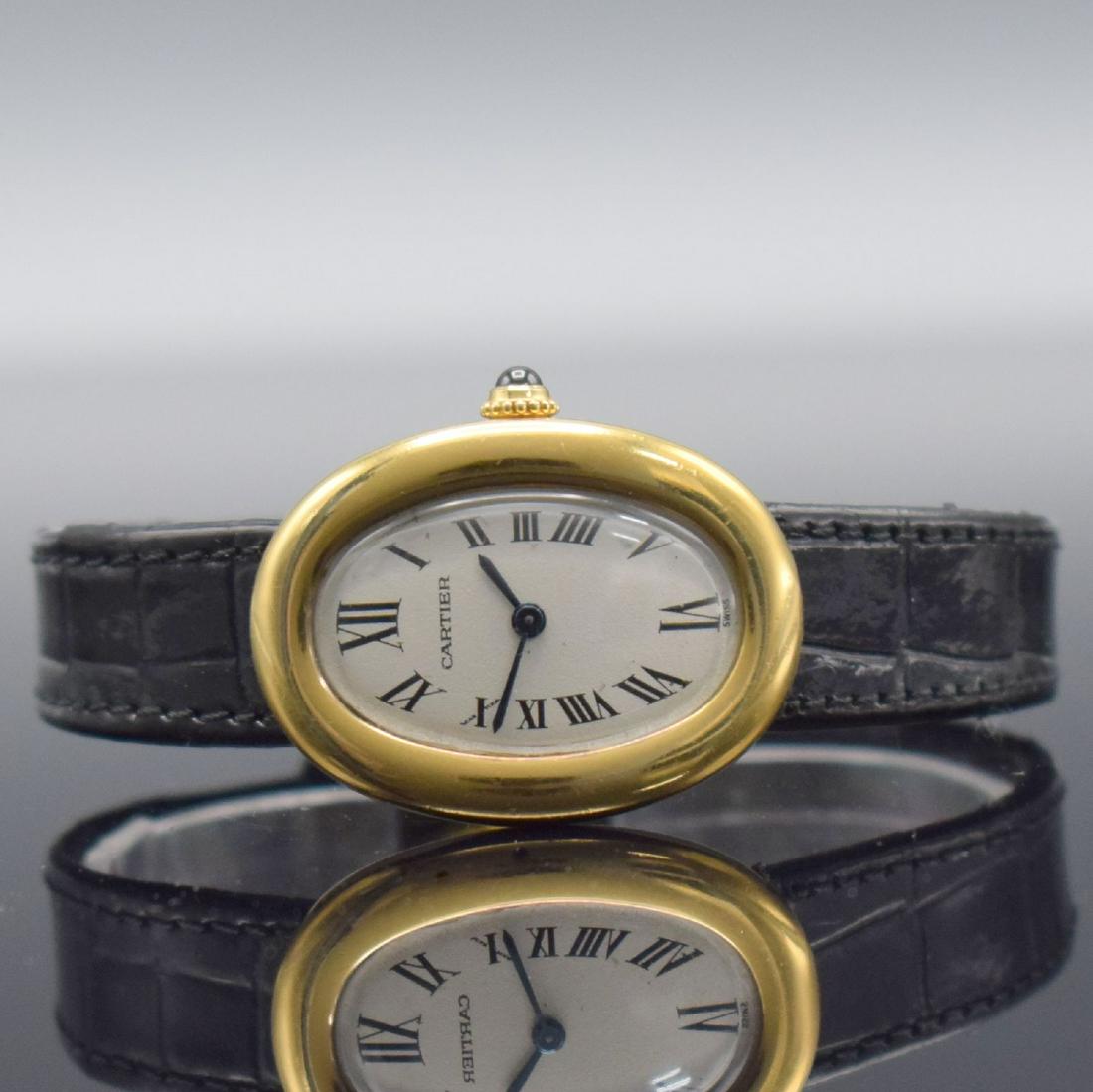 CARTIER Paris 18k yellow gold ladies wristwatch: CARTIER Paris 18k yellow gold ladies wristwatch series Baignoire, Switzerland around 1990, quartz, case back screwed-down 4 -times, silvered dial with Roman hours due to age slightly spotty, blued ste