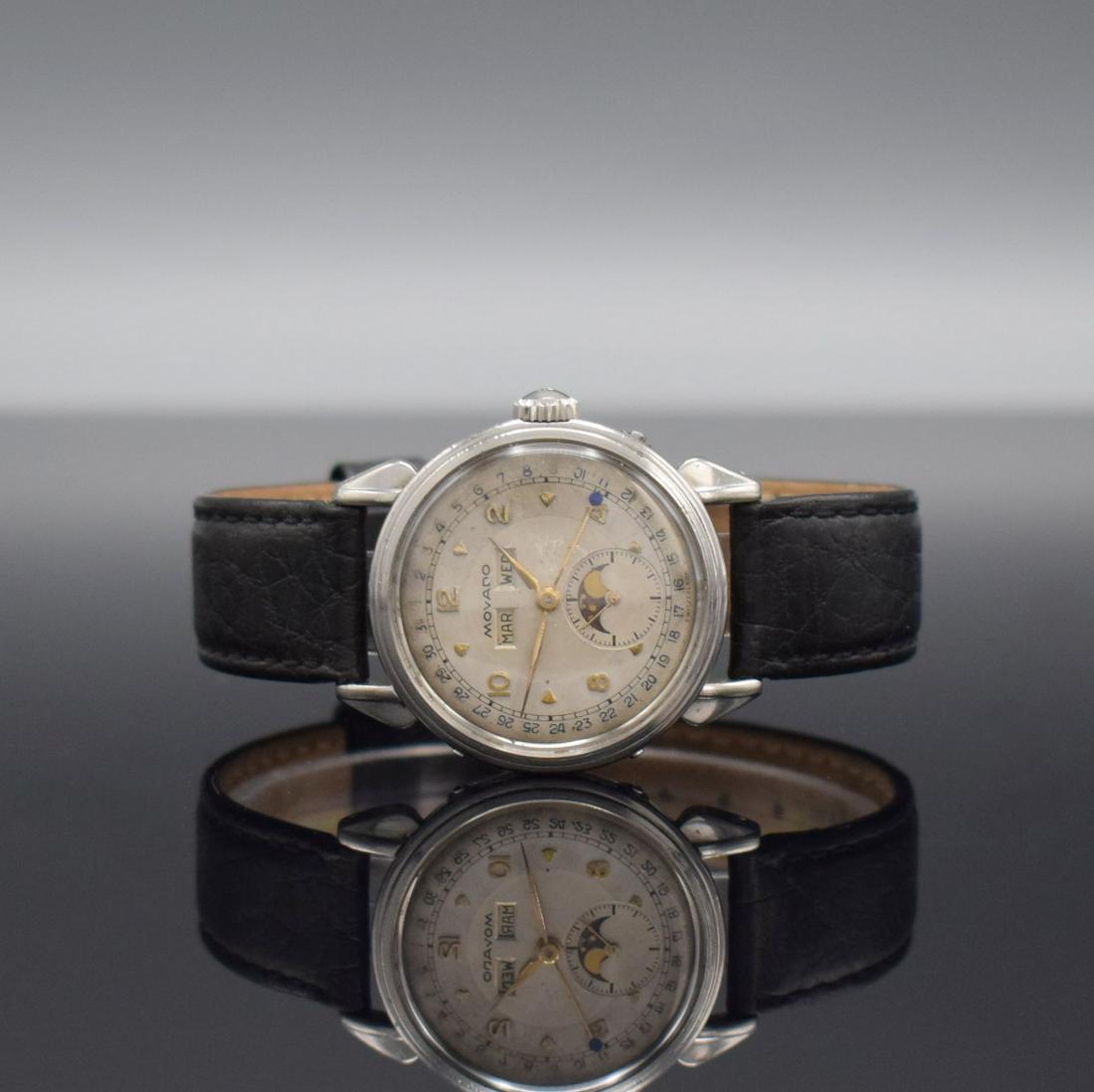 MOVADO gents wristwatch with calendar: MOVADO gents wristwatch with calendar, Switzerland 1940`s, stainless steel case with teardrop lugs, screwed down case back, correction at the sides in case inserted, silvered duoton dial with gilded r