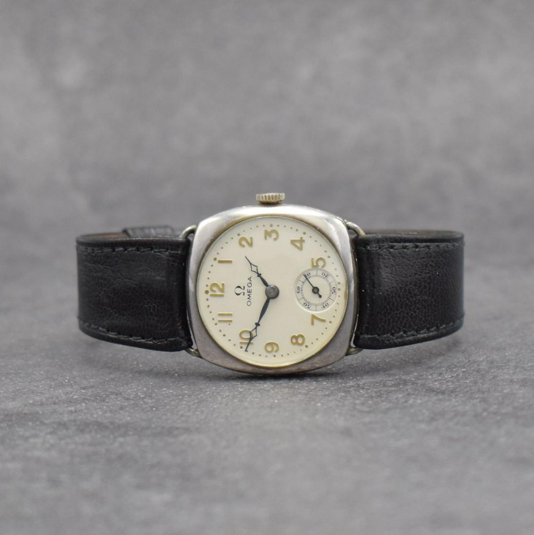 OMEGA early wristwatch in silver, Switzerland around: OMEGA early wristwatch in silver, Switzerland around 1925, manual winding, 3-piece Carré- Cambré case, snap on case back & bezel, silvered dial with gilded Arabic numerals restored, constant second 