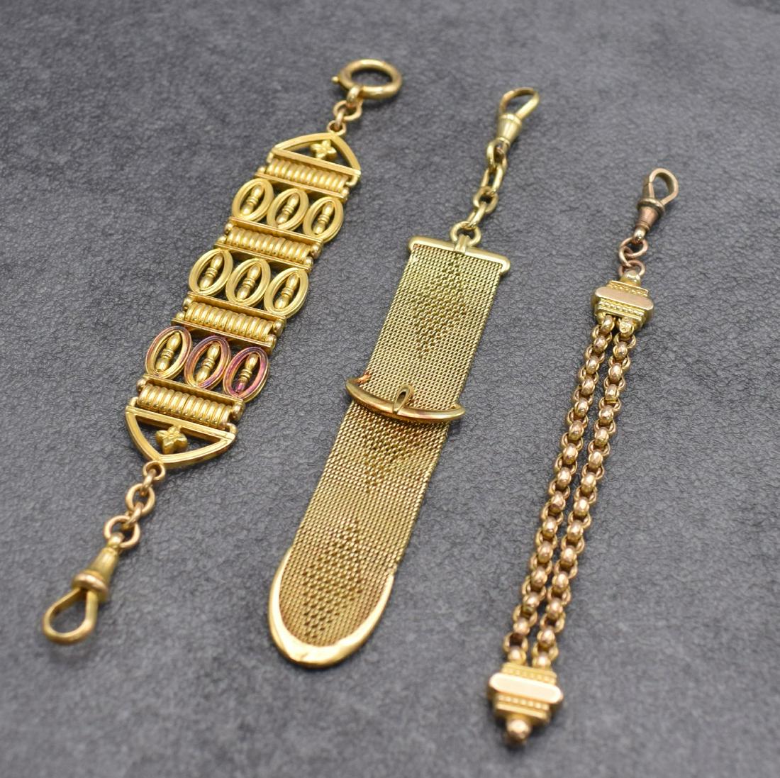 3 gold Chatelaines around 1870 - 1920: 3 gold Chatelaines, around 1870 - 1920, 1) 15k yellow gold, 2) 14k yellow gold, 3) 9k pink gold, total-weight approx. 39, useable, from the estate of a collector