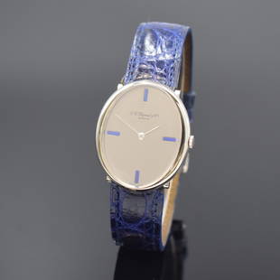 CHOPARD 18k white gold wristwatch reference 2031: CHOPARD 18k white gold wristwatch reference 2031, Switzerland around 1970, manual winding, 2-piece construction case, snap on bezel, silvered dial with lapis lazuli-indices, silvered hands, gold-plate