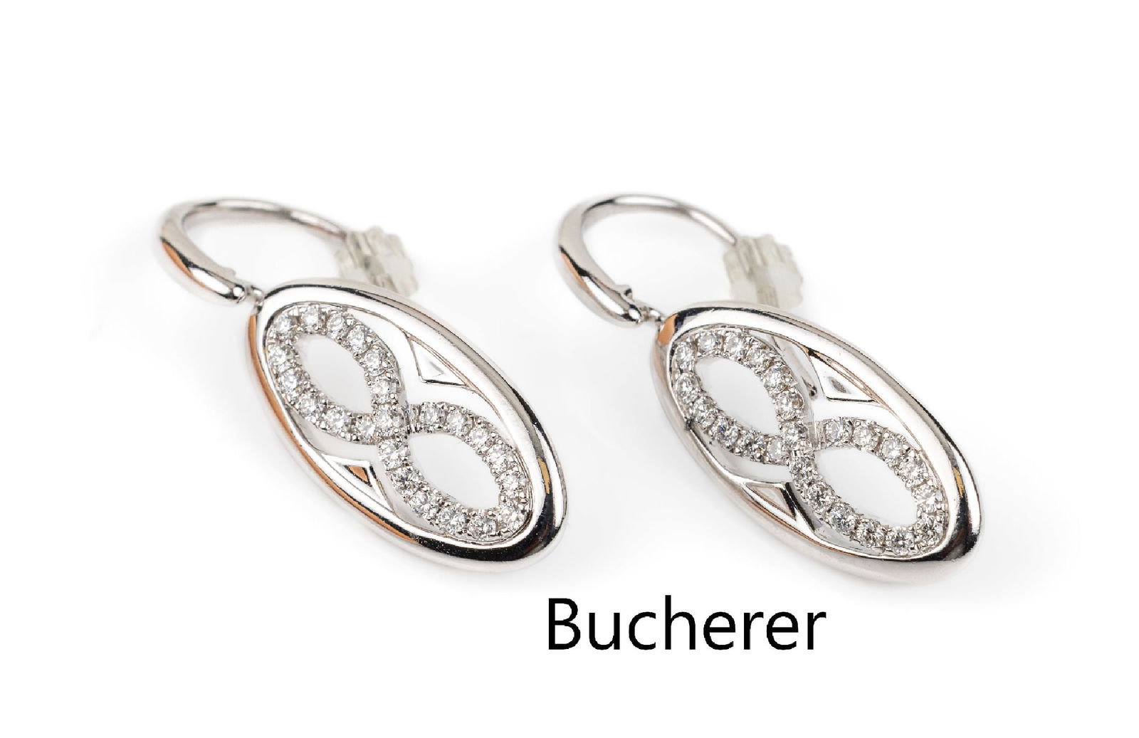 Pair of 18 kt gold BUCHERER brilliant-earrings: Pair of 18 kt gold BUCHERER brilliant-earrings , WG 750/000, each 23 brilliants total approx. 0.49 ct Wesselton/si, l. approx. 3 cm,approx. 6.4 g, case and invoice attached