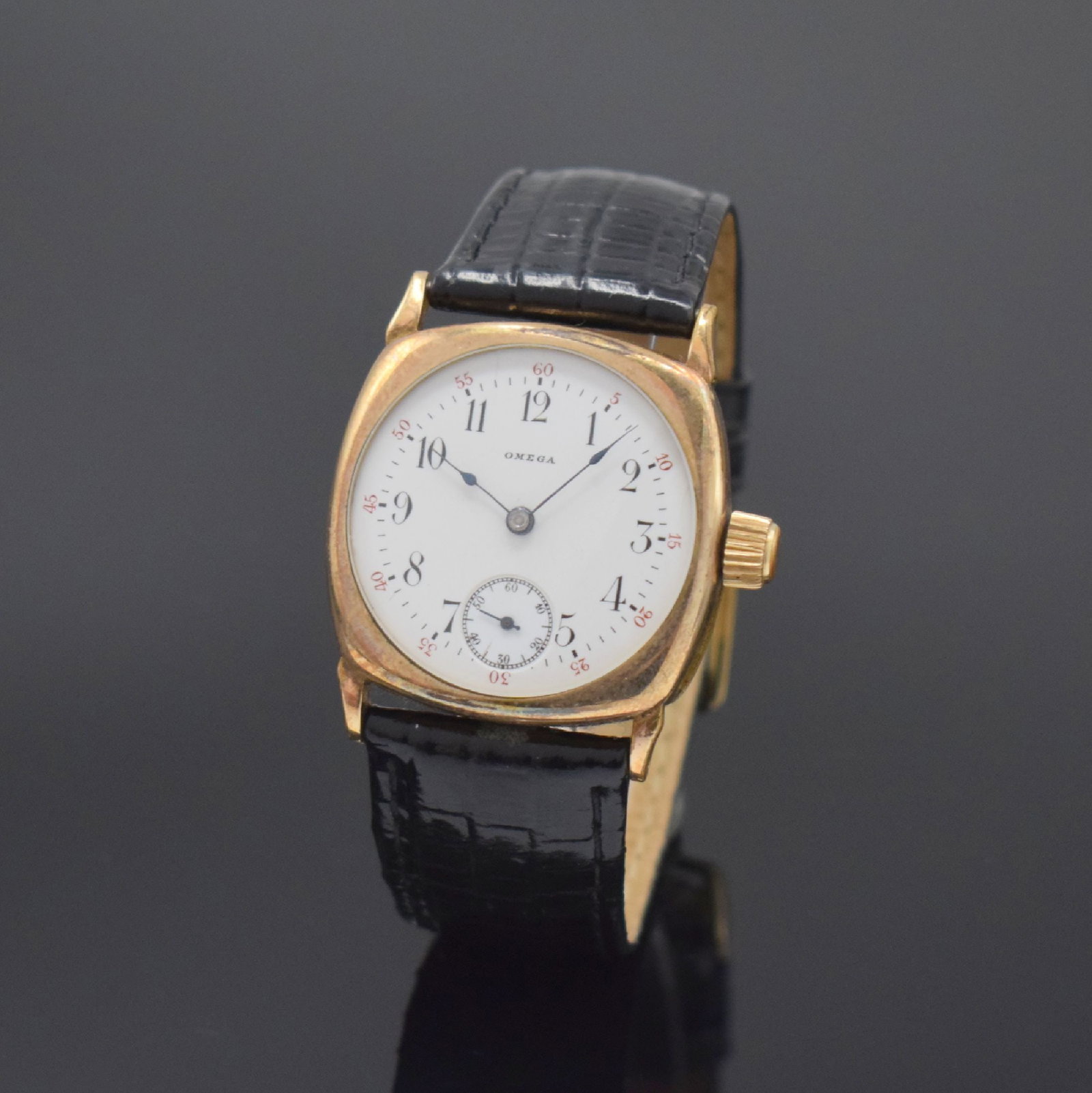 OMEGA early gilt wristwatch for the American market: OMEGA early gilt wristwatch for the American market, Switzerland / USA around 1910, manual winding, 3-piece construction Carre-Cambre- case, snap on case back and bezel, enamel dialdamaged, constant s