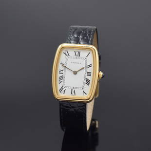 CARTIER Paris rare 18k yellow gold wristwatch: CARTIER Paris rare 18k yellow gold wristwatch, manual winding, France around 1980, two- piece construction tonneau-shaped case, bezel to case back screwed-down 4-times, case back with dedication