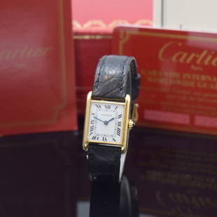 CARTIER Paris Tank 18k yellow gold ladies wristwatch: CARTIER Paris Tank 18k yellow gold ladies wristwatch, Switzerland around 1982, manual winding, two-piece construction case at the sides 4-times screwed down, leather strap has to be replaced, original