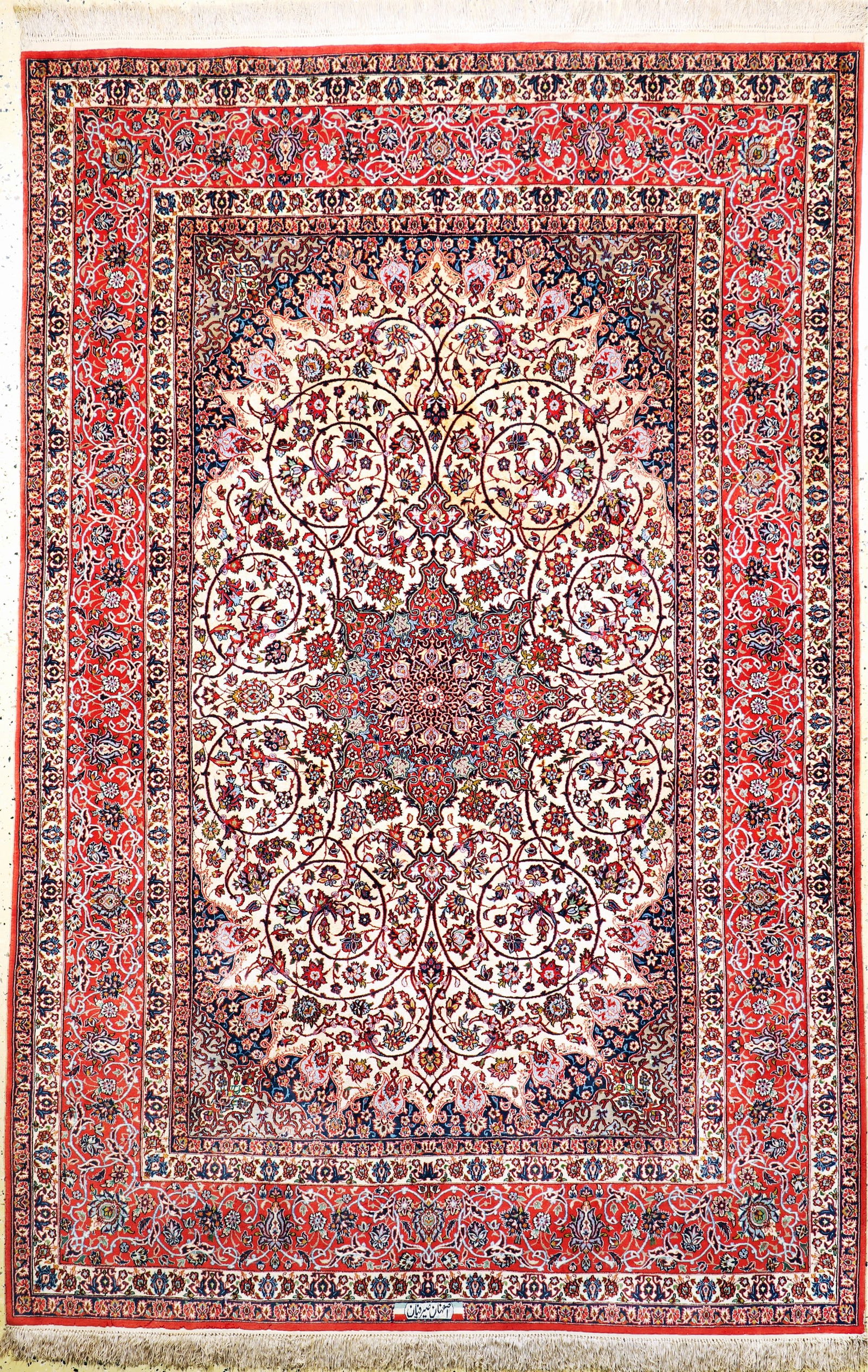 Isfahan fine # 'silk ground #', Persia, late 20th: Isfahan fine # 'silk ground #', Persia, late 20th century, corkwool with and on silk, approx. 295 x 195 cm, signature probably not original, condition: 2 (moth damage), cleaned.Rugs, Carpets & Flatwea