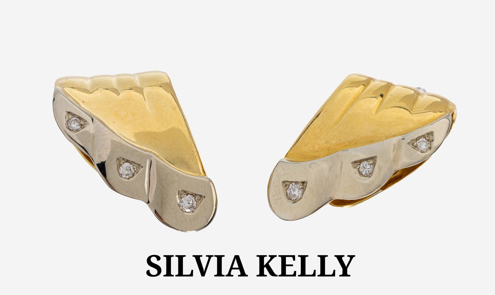 Pair of 18 kt gold brilliant-earhoops: Pair of 18 kt gold brilliant-earhoops , YG/WG 750/000, swung design, 6 in WG set brilliants total approx. 0.30 ct Wesselton/si,approx. 16.2 g, manufacturer SILVIA KELLY