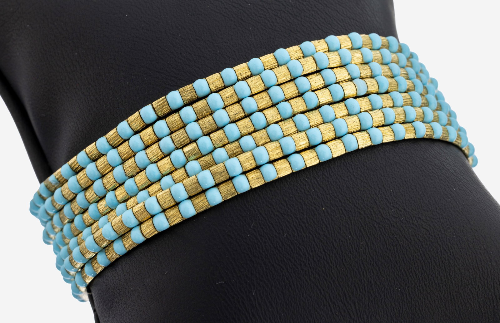 18 kt gold turquoise-bracelet: 18 kt gold turquoise-bracelet , YG 750/000, heavy high quality workmanship, 7-row, small turquoise-cabochons, l. approx. 20 cm, case lock with safety eight, approx. 56.0 g