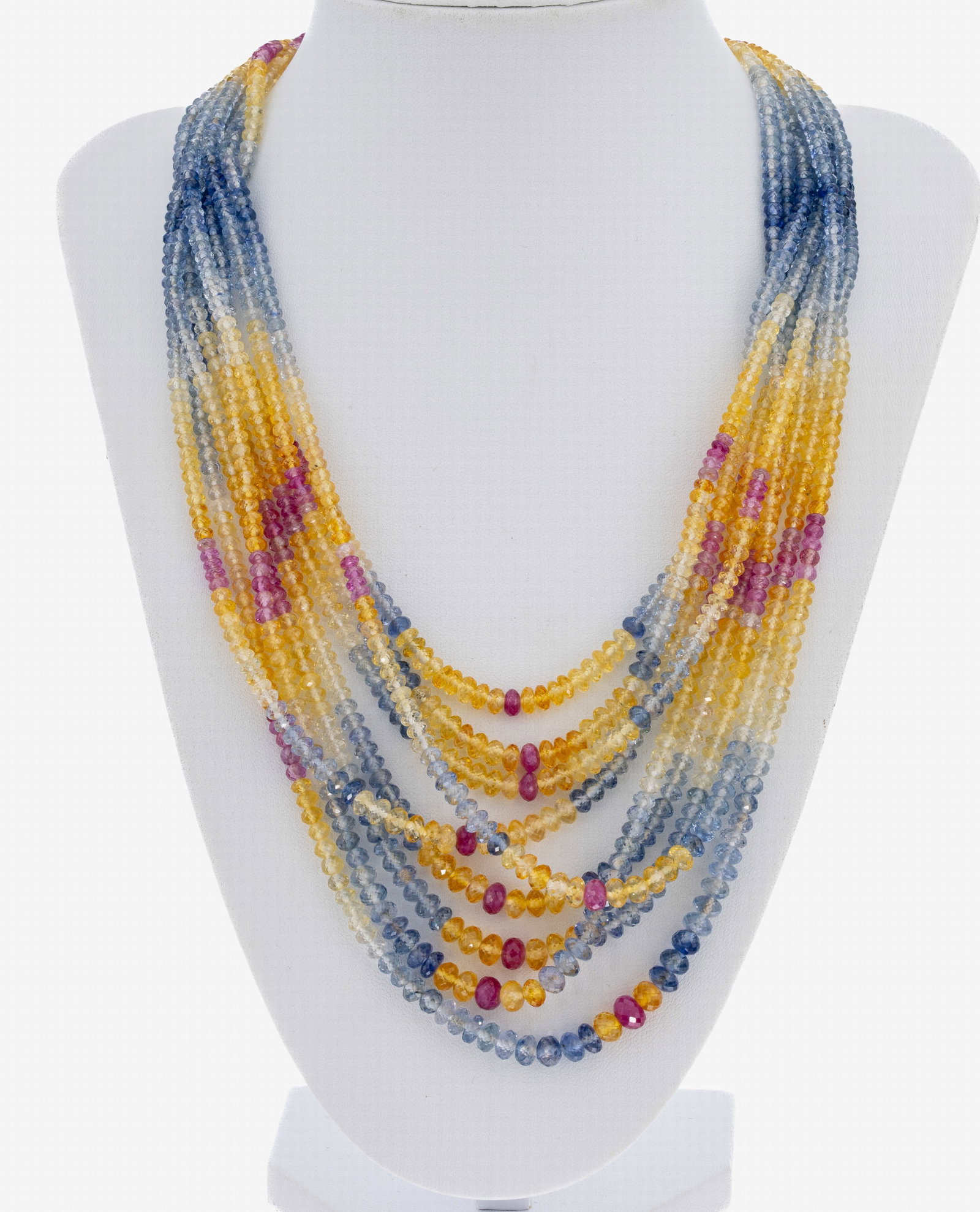 Multi-strand sapphire necklace: Multi-strand sapphire necklace , decorative 9-row necklace made of faceted sapphire rondelles, diam. approx. 3.6-5.4 mm, in finelygraduated color nuances, the numerous strands display a vibrant play o