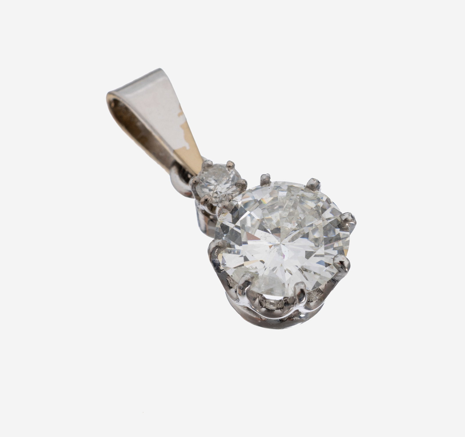 18 kt gold brilliant-pendant: 18 kt gold brilliant-pendant , WG 750/000, brilliant approx. 1.14 ct (engraved) Wesselton/p1, brilliant on top approx. 0.05 ctWesselton/p, approx. 1.5 g