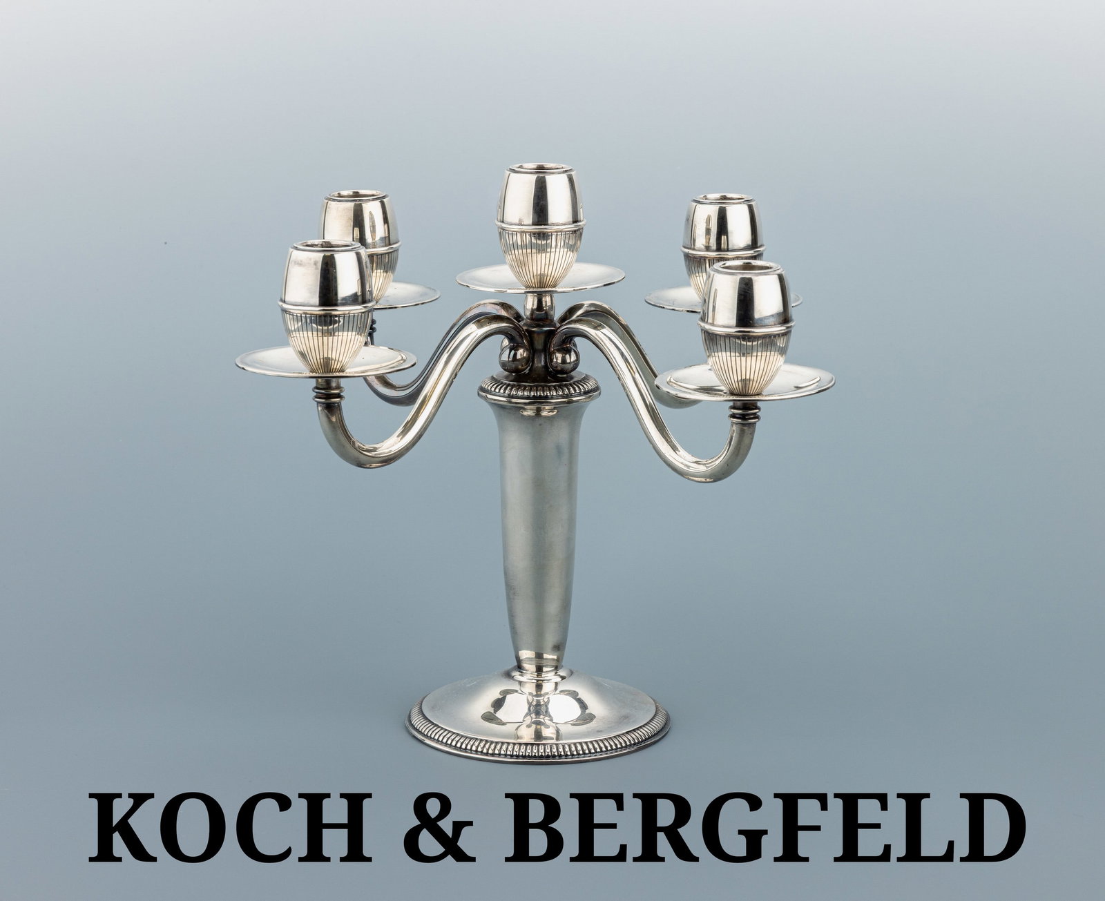 KOCH & BERGFELD five-light candelabrum, 1950s: KOCH & BERGFELD five-light candelabrum, 1950s , Sterling silver 925, finely crafted five-light candelabrum with a circular base decorated with a beaded border, the scrolling arms terminate in fluted