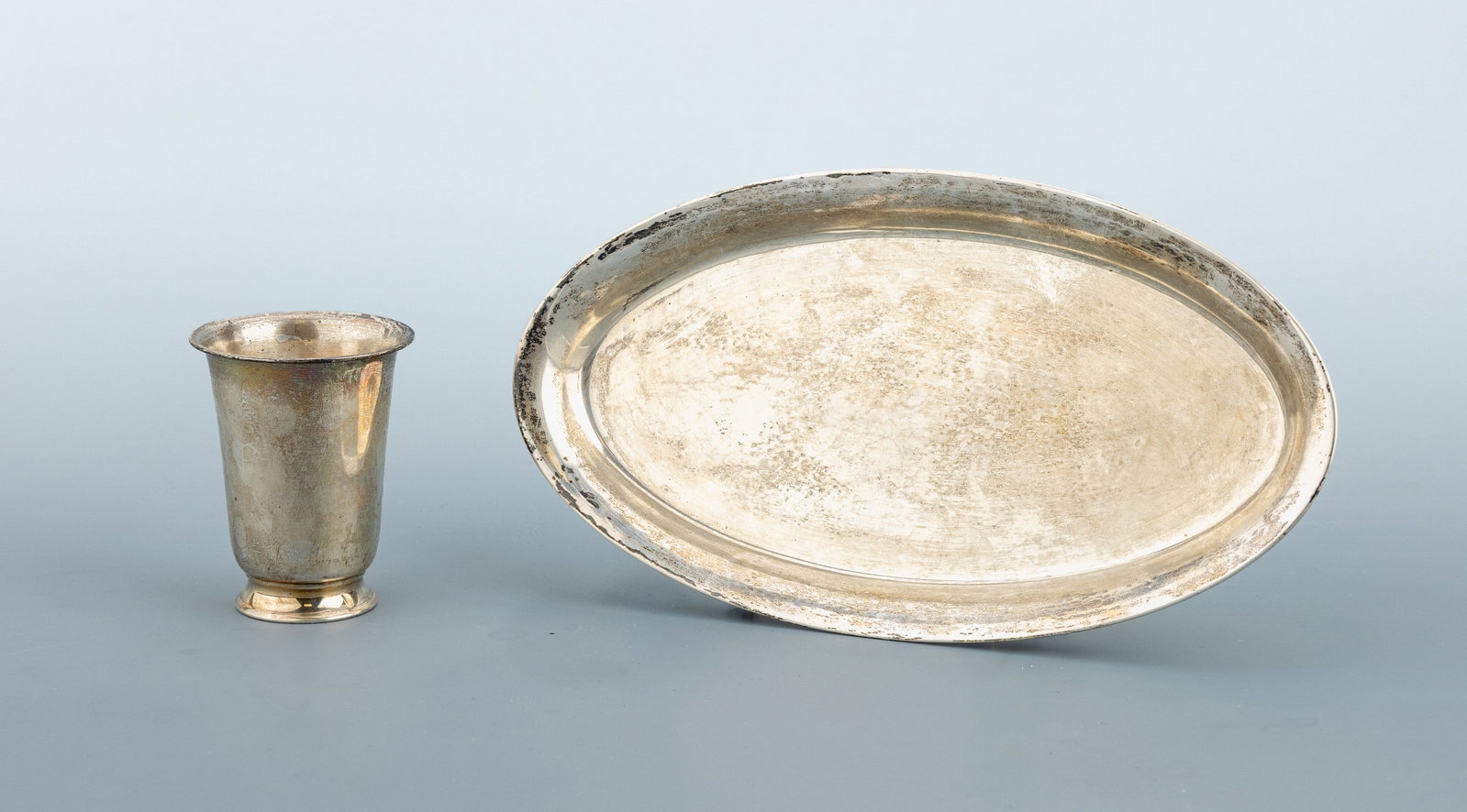 Tray, approx. 1930s: Tray, approx. 1930s , silver 800, hammer finish, approx. 20 x 11 cm, maker's mark unidentified, together with a small drinking cup, silver 830, after 1954, conical body with flared rim, h. approx. 7 c