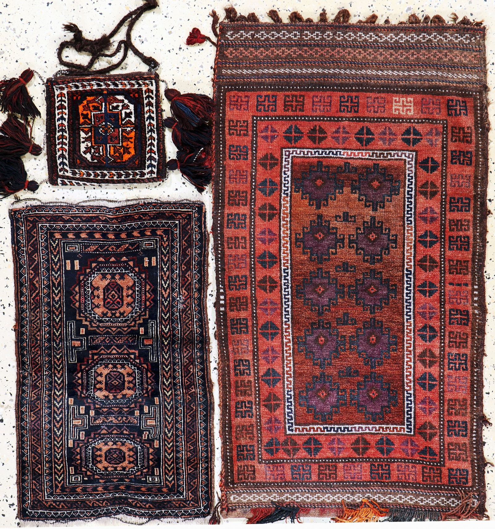 3 lots of Baloch, Persia, early 20th century, wool on: 3 lots of Baloch, Persia, early 20th century, wool on wool, approx. 113 x 91 cm & approx. 73x 45 cm, condition: 2-3. Rugs, Carpets & Flaweaves