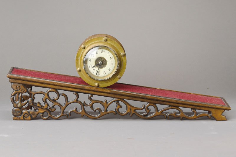 Clock on an inclined plane