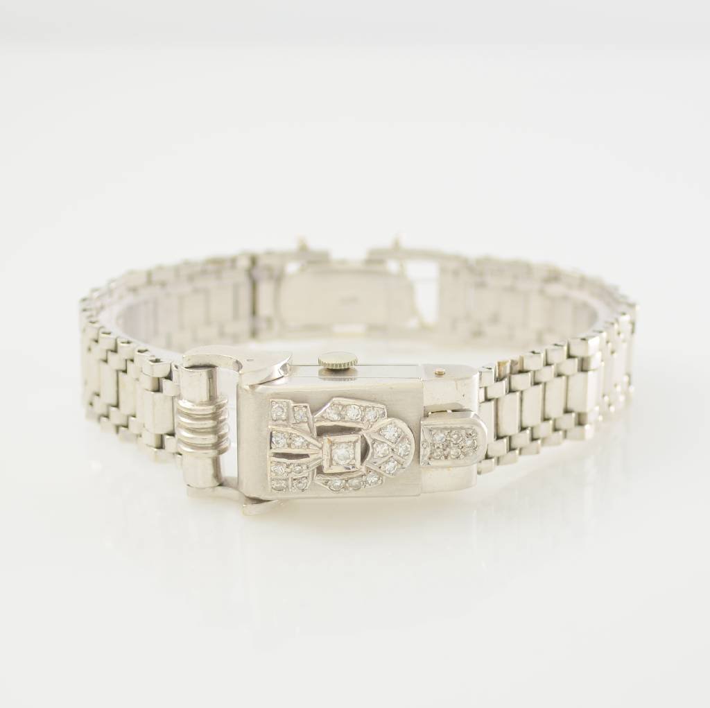 A. NICOLET unusual 14k white giold ladies wristwatch: A. NICOLET unusual 14k white giold ladies wristwatch, manual winding, Switzerland around 1935, snap on case back, dial under diamond set hunter cover, dial marked Mandyk due to age spotty/colour tinte