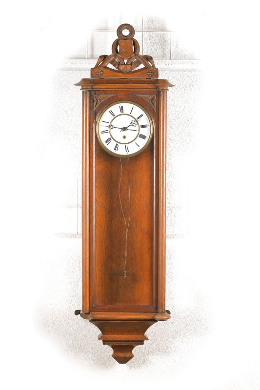 wall clock, with a weight: wall clock, with a weight, German, around 1870/80, wood housing in Gothic Revival, one column base lower left and 4 small crowns missing, large two-part enamel dial, conical massive brass plate moveme