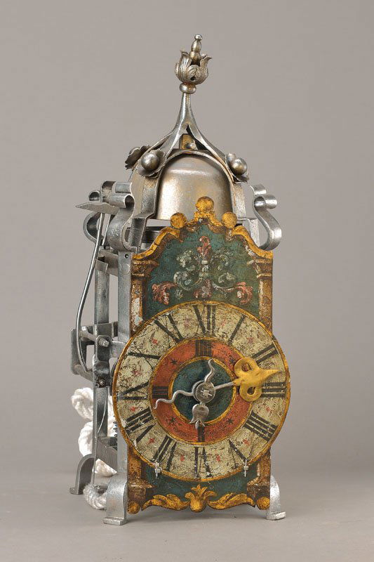 wall clock: wall clock Asked in gothic style, after ancient model, ironwork in tunnel construction, four diagonal corners, painted iron dial, large hour hand and small hand which is pointing on the inner quarter