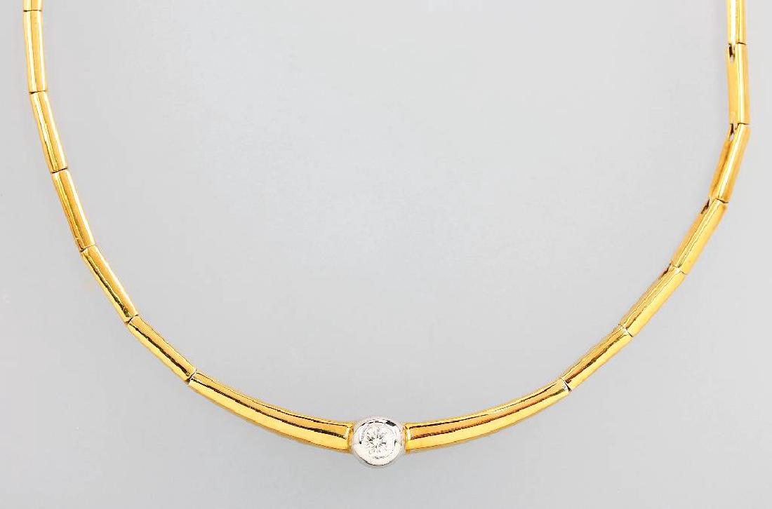18 kt gold necklace with brilliant: 18 kt gold necklace with brilliant, YG 750/000(tested), brilliant in WG setting, approx. 0.20 ct Wesselton/si1, l. approx. 42 cm, case lock with safety eight, approx. 20.3 g, in case