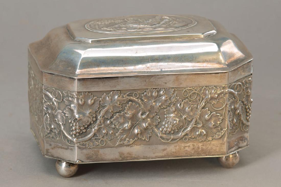 lidded box: lidded box, german, around 1850-60, 13 lot silver, wall opulent embossed with wine leavesand grapes decor, cover with embossment of a lying woman, age related slightly dented, approx. 10x15x10cm