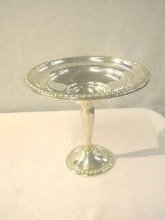 Sterling 6" Compote with Rope Trim by Rogers.: This is a very nice compote that has rope like trim on the upper edge and around the base. Inside the trim on the top is a reticulated section. The base is stamped Rogers Sterling Weighted