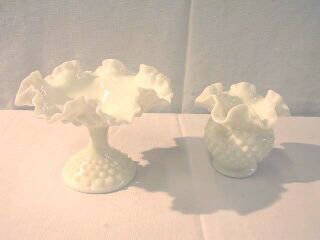 White Milk Glass Compote & Bowl Hobnail: 2 pieces of white milk glass, probably Fenton. Both pieces are hobnail with ruffled edges. The compote is 5-1/2" high and sits on a base that is 4" wide. The compote is in good condition. The