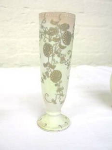 Occupied Japan Bud Vase w. Moriage: 7-1/4" tall ivory vase stamped Ucagco China Made in Occupied Japan. There is white moriage beading around the upper rim and base. Gold moriage decoration covers the front and sides of the vase.