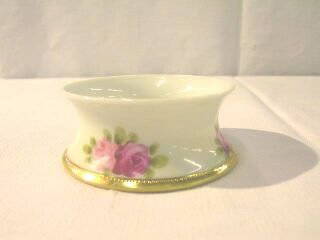 Unusual Nippon Gilded Rose Dish: This is a small bowl stamped in green Hand Painted Nippon. It is 1-1/2" high; 3-1/2" wide at the top; 3-3/4" wide at bottom. The decoration is on a white background. There are pink roses on the