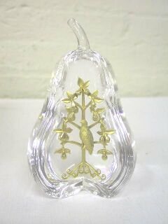 Steuben Partridge in a Pear Tree Figurine 18kt.: This is a rare piece of Steuben crystal. It is a partridge in a pear tree. The pear is crystal and has a section on the fron that has been "sliced" out. Within this section is an 18kt gold partridge i