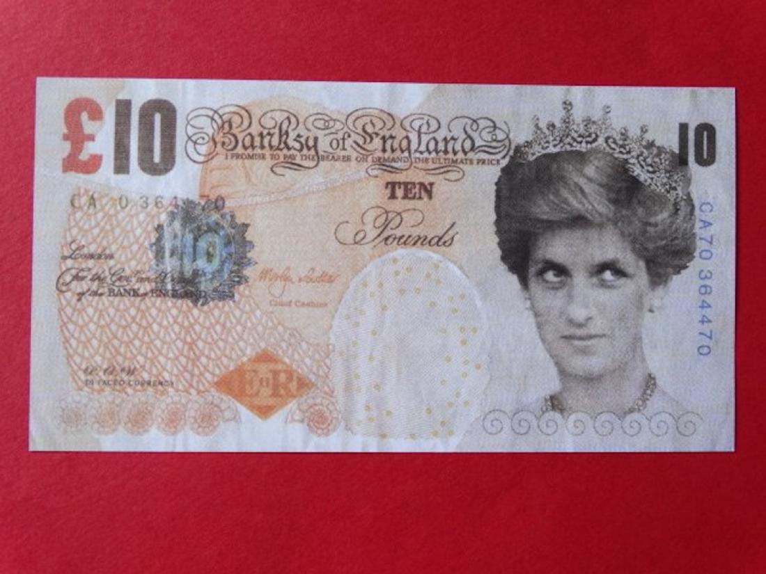 BANKSY: Banksy Di-Faced tenner note (2004) designed by Banksy. About the note the front reads "Banksy of England". DI FACED CURRENCY. "Please note that these notes do not have any of the security features of 